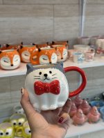 گربه پاپیون قرمز